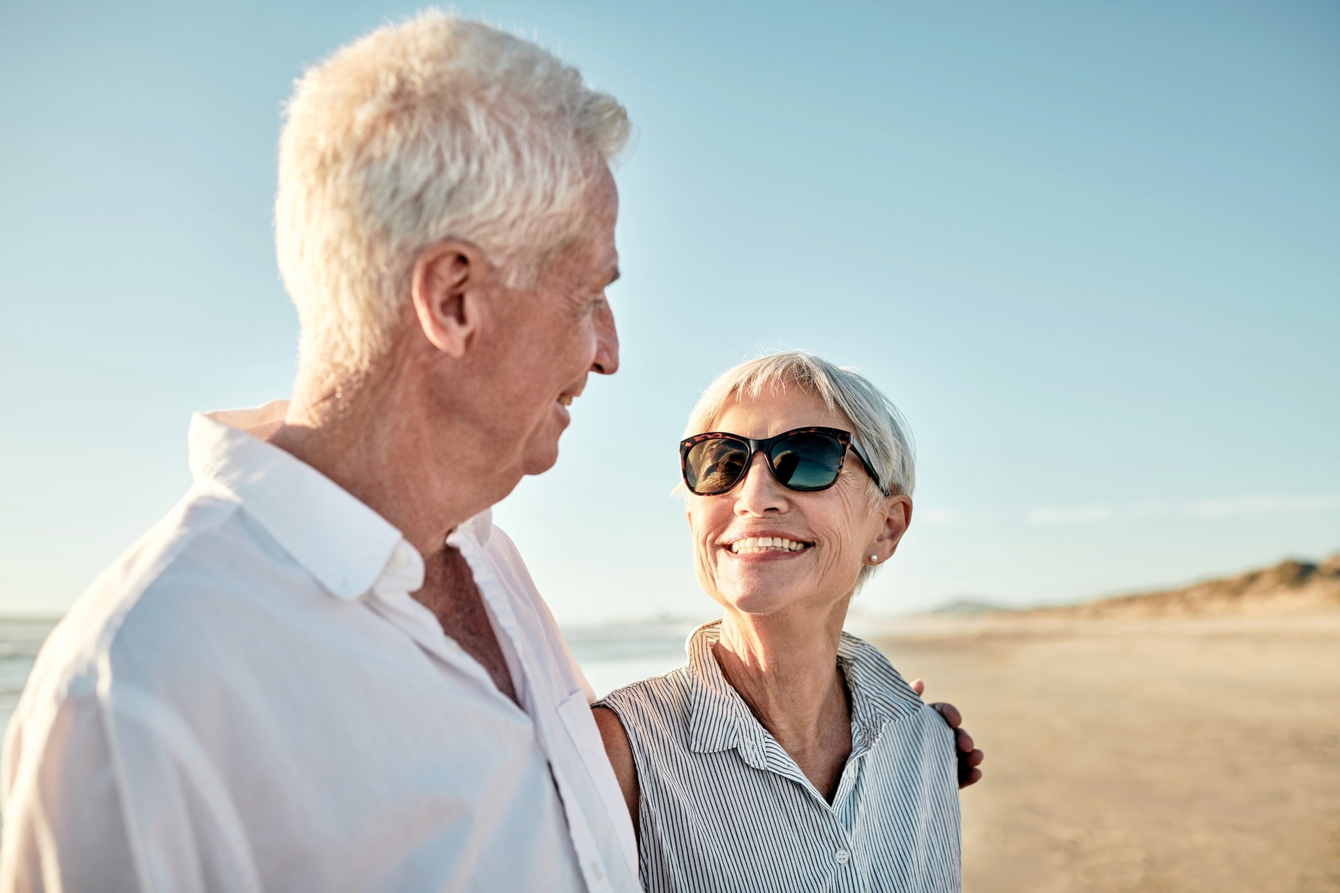 Shot of a senior couple going for a leisurely walk on the beach
