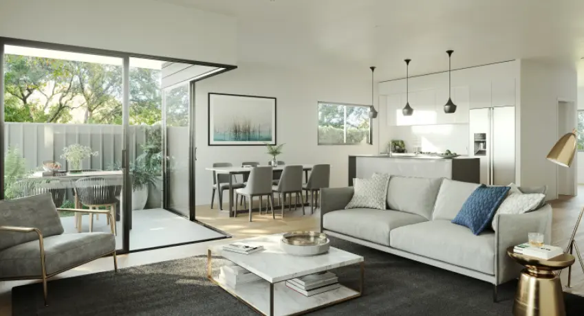 Modern lifestyle village living room with light gray sofa (blue pillow), marble coffee table, gray rug, and large windows opening to dining area and greenery.